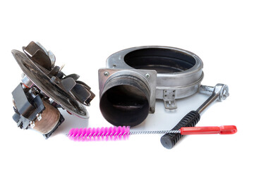Smoke extractor motor, disassembled for cleaning, isolated on white background. Stove maintenance...