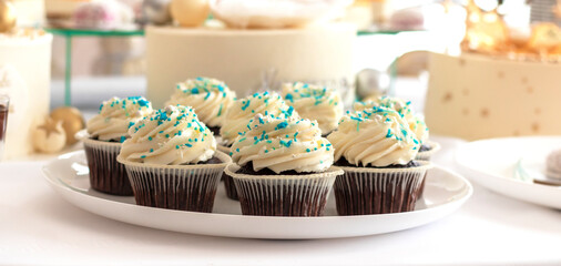 selective focus. Tasty candy bar for Birthday party on table against color background. High quality photo