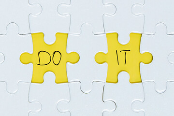Fototapeta premium Missing a pieces of puzzle in the center, yellow space with word 
