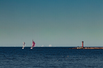 sailboat on the sea,autumn regatta at sea, small yachts with sails