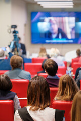 Fototapeta premium Online conference in narrow room