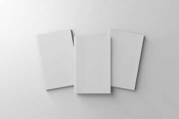isolated on gray background. 3 white cover book mockup.