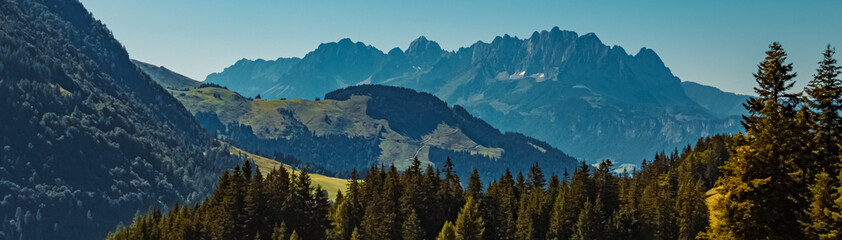 Obraz premium Beautiful alpine summer view with the famous Wilder Kaiser mountains in the background at Fieberbrunn, Tyrol, Austria