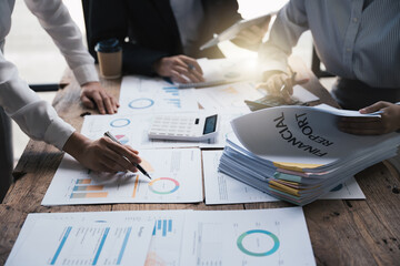 Business team analyze and discuss the situation on the financial report in the meeting room, Business and Financial concept.