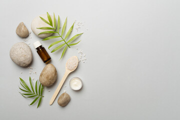 Composition with spa products on color background, top view