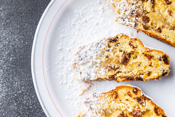 stollen christmas pie sweet pastries dried fruits, marzipan, nuts delicious snack healthy meal food snack diet on the table copy space food background rustic top view
