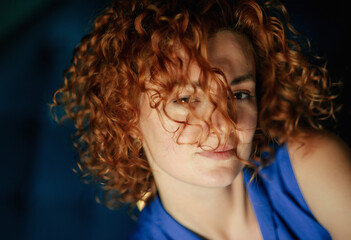 portrait of young Caucasian ginger girl . Healthy lifestyle, beauty, natural concept. Melancholic beautiful portrait