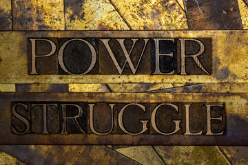 Power Struggle text on grunge textured copper and gold background