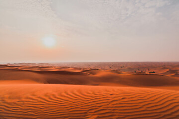 Sunset in sand dunes of desert