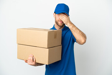 Delivery man over isolated white background covering eyes by hands. Do not want to see something
