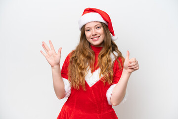 Obraz na płótnie Canvas Young caucasian woman with Christmas dress isolated on white background counting six with fingers