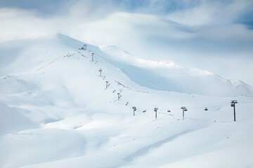 Minimalistic ski resort view with chairlift