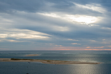 Beautiful seascape at sunset seen from dune at Pilat. France