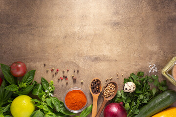 Fresh vegetables with herbs and spice at background table. Natural healthy homemade food concept