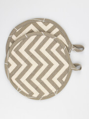 a set of kitchen tacks made of cotton fabric with a loop, isolated on a white background