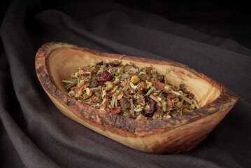 Full leaf loose green,black tea in wooden spoon