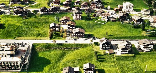 Obraz premium Amazing aerial view of Sappada, small town in the Dolomite Mountains, Italy