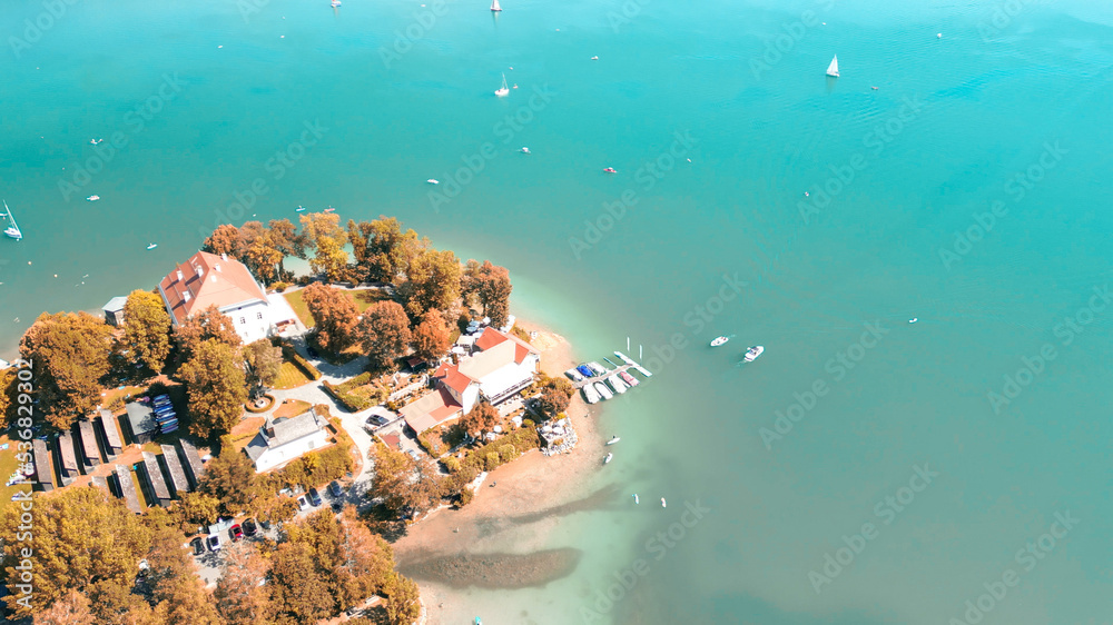 Poster Klagenfurt Lake in summer season from drone, Austria