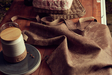 leather apron resting on the bar counter