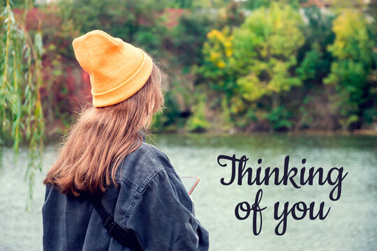 Thinking Of You - Card. The Girl Is Standing On A Pier In An Orange Cap, The Lake.