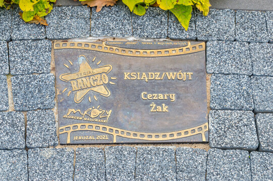 Jeruzal, Poland - October 5, 2021: Plaque of Priest and mayor (Cezary Zak). Plaque dedicated actor to Ranczo Polish television comedy series.