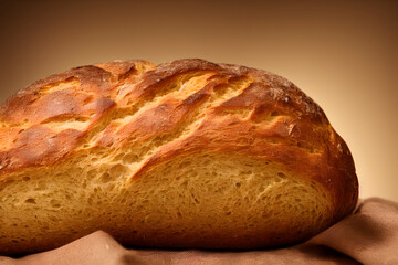 a loaf of bread, high calorie staple food, well baked and crusty