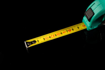 tape measure isolated on black background