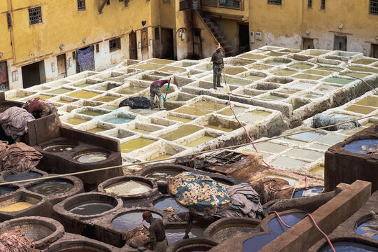 Men working at Chouara tannery in the old town of Fez