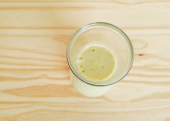 Brazilian avocado smoothie on a wooden background