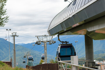 lifts of the mountain cable car on the background of mountains