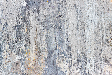 Old painted wall with scratches and cracks, grunge background