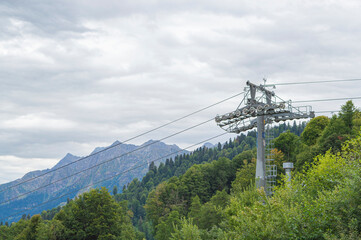 lifts of the mountain cable car on the background of mountains