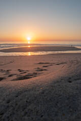 Fototapeta na wymiar Landscape of sunset in Murtosa beach. Aveiro, Portugal.