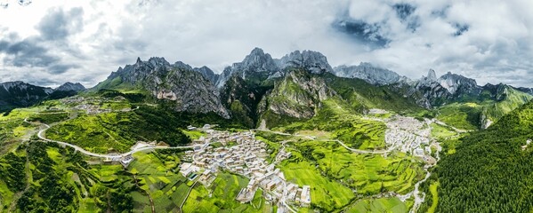 Aerial panorama of Gannan Tibetan Autonomous Prefecture in Gansu Province, China with cloudy sky