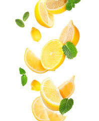 Fresh flying lemons and mint leaves isolated on white