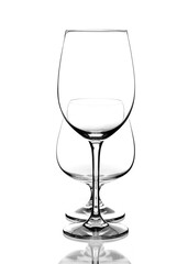 Glass wine glasses for wine and cognac on a white background