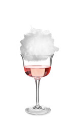 Glass with delicious cotton candy cocktail on white background