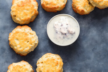 biscuits and gravy, breakfast food item, a yummy and savory meal