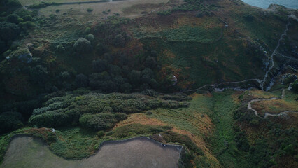 birds eye view of grassy hills in the countryside