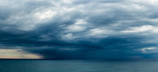Dramatic sky and clouds during a storm over Mediterranean Sea, Valencia, Spain, Europe