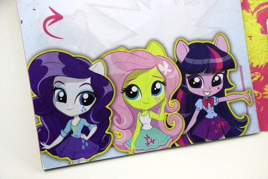 Twilight Sparkle, Fluttershy, Rarity. Magazine with the characters of Equestria Girls. My little Pony. 
TV series. Illustration. Modern and fashion girls. 
Teenagers.