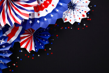 USA paper fans and confetti on black background. Banner mockup for Veterans Day, Memorial Day, 4th...