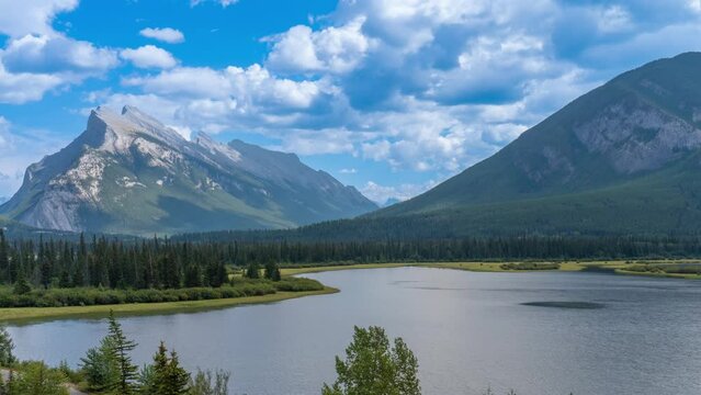 4K time-lapse UHD video of Vermilion Lakes with Mount Rundle and Sulphur Mountain in the background, Alberta, Canada. summer autumn foliage scenery in Banff National Park, Canadian Rockies