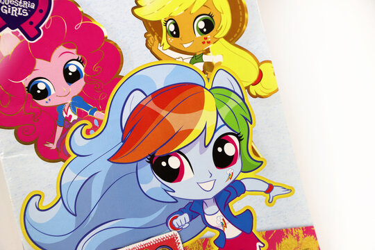 Rainbow Dash, Applejack, Pinkie Pie. Magazine with the characters of Equestria Girls. My little Pony. TV series. Illustration. Modern and fashion girls. Teenagers.