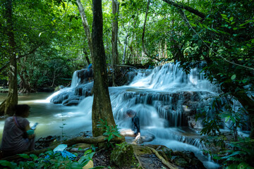 Fototapeta na wymiar The beautiful waterfall in the national park of Thailand.