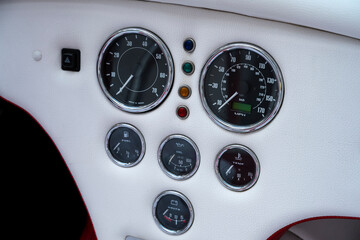 Dashboard of the car. Speedometer and tachometer. Engine information. Information for the driver