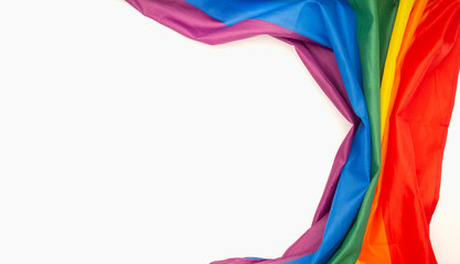 The rainbow flag or LGBT is on a white background with copy space for text
