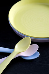 Macro Image of Colorful Baby Spoons and Plates
