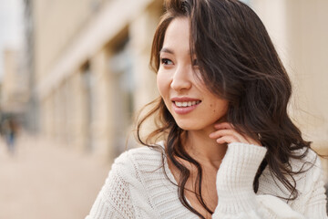 Lifestyle portrait beautiful Asian kazakh woman with brilliant smile