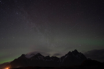 northern lights in starry night sky 